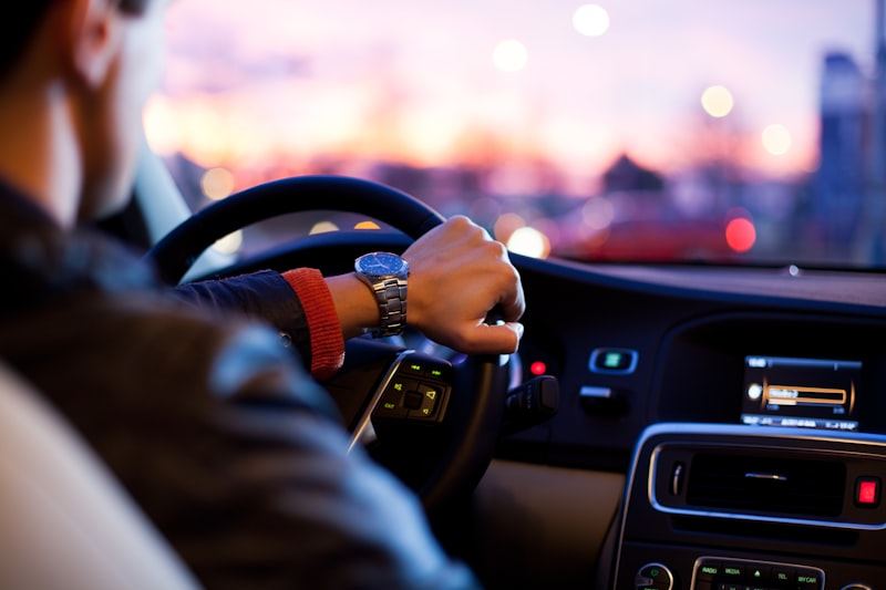 QuickCabz driver assisting a traveller with a comfortable cab